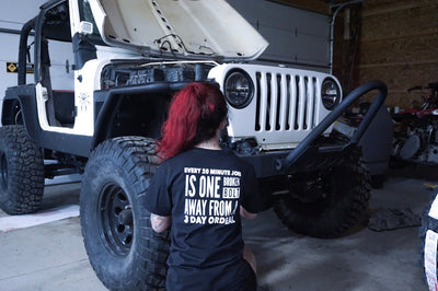 graphic tee front — One broken bolt unisex shirt